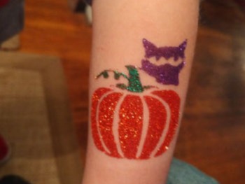 pumpkin glitter tattoo