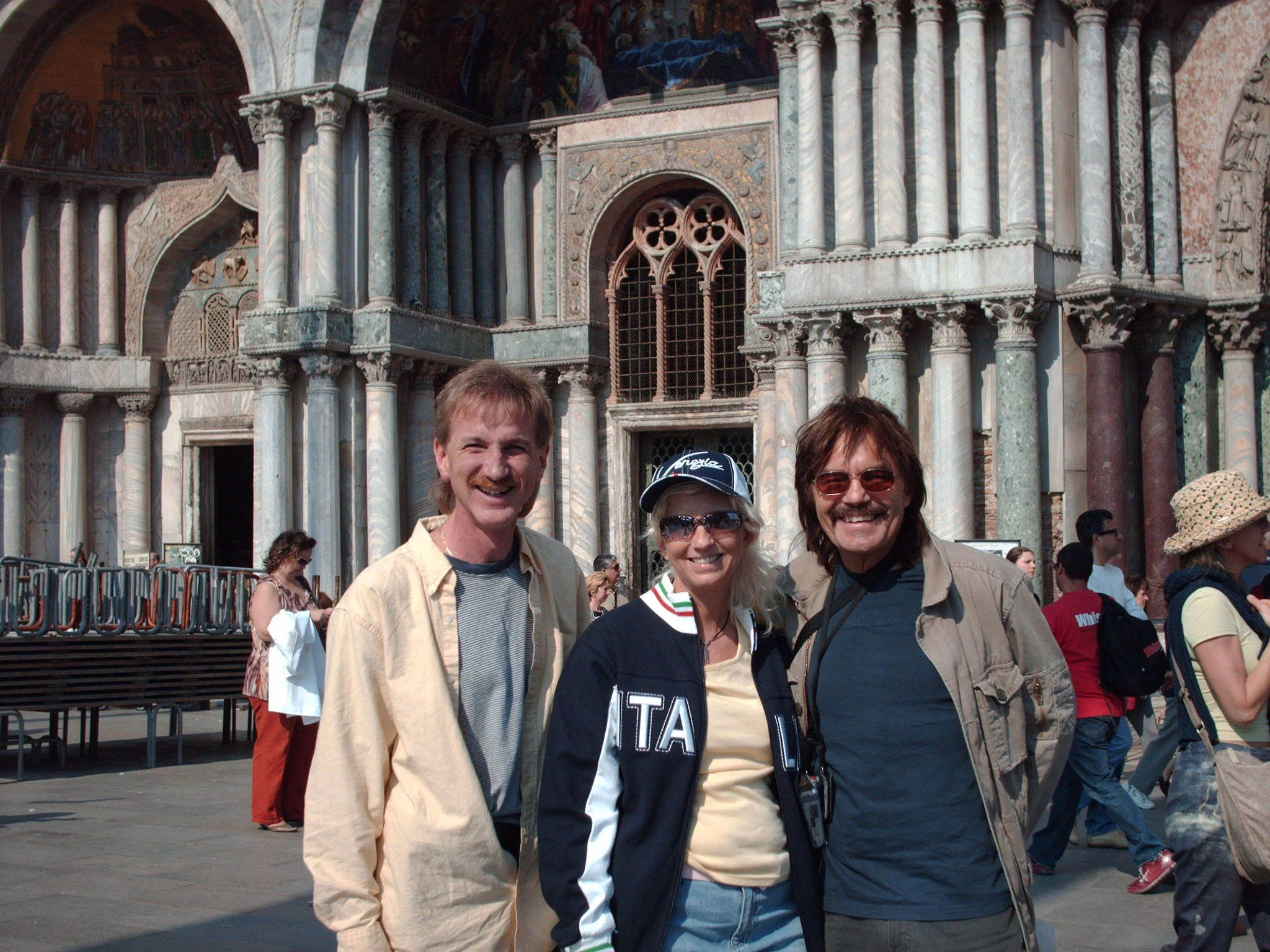Rodney Kelley, Donna Moore, Rick Moore in front of St. Marks Basilica in Venice, Italy
