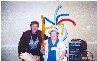 lady wearing crazy balloon hat at magic show