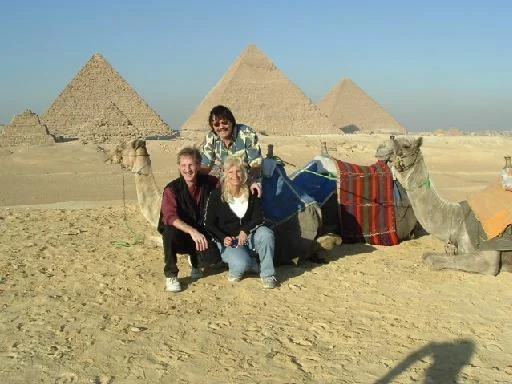 Magician Rodney Kelley, Magician Rick Moore, Donna Moore in front of the Giza Pyramids in Egypt