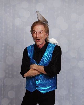 Nashville Magician Rodney Kelley with dove on his head and shoulder
