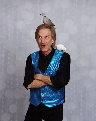 Nashville Magician Rodney Kelley with dove on his head and shoulder